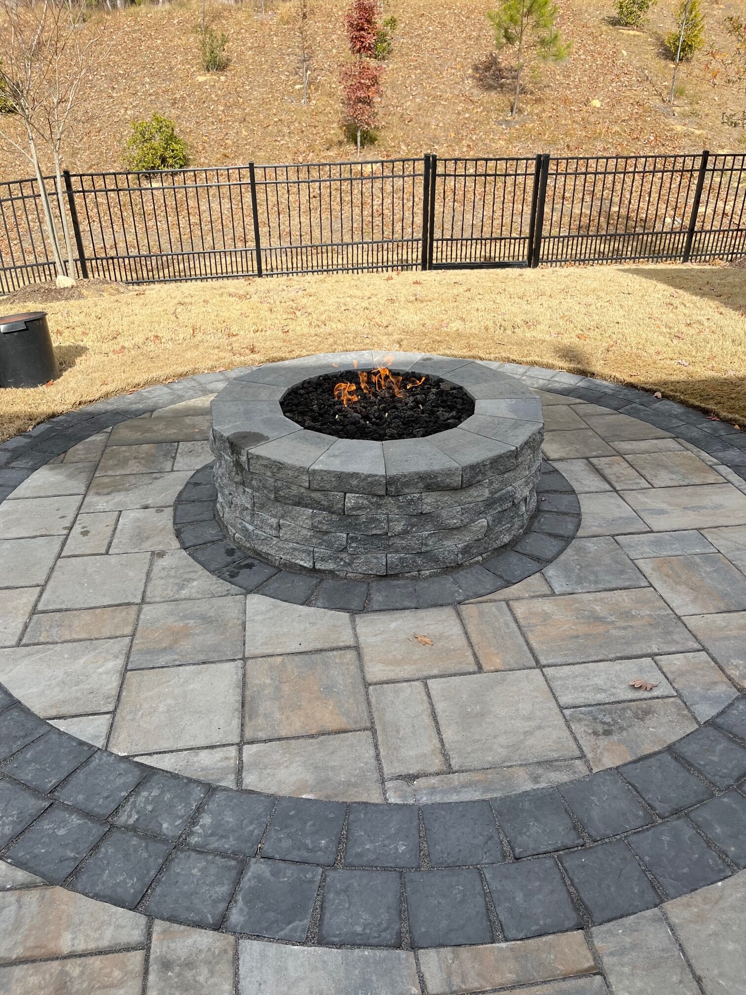 stone fire pit installed by Arbor Landscape and Irrigation